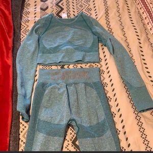 Medium size Gymshark  crop top and high waist pants set.